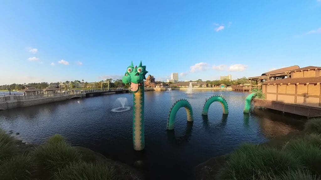 water dragon made of Legos at Disney Springs on lake Buena vista looking towards Marketplace district