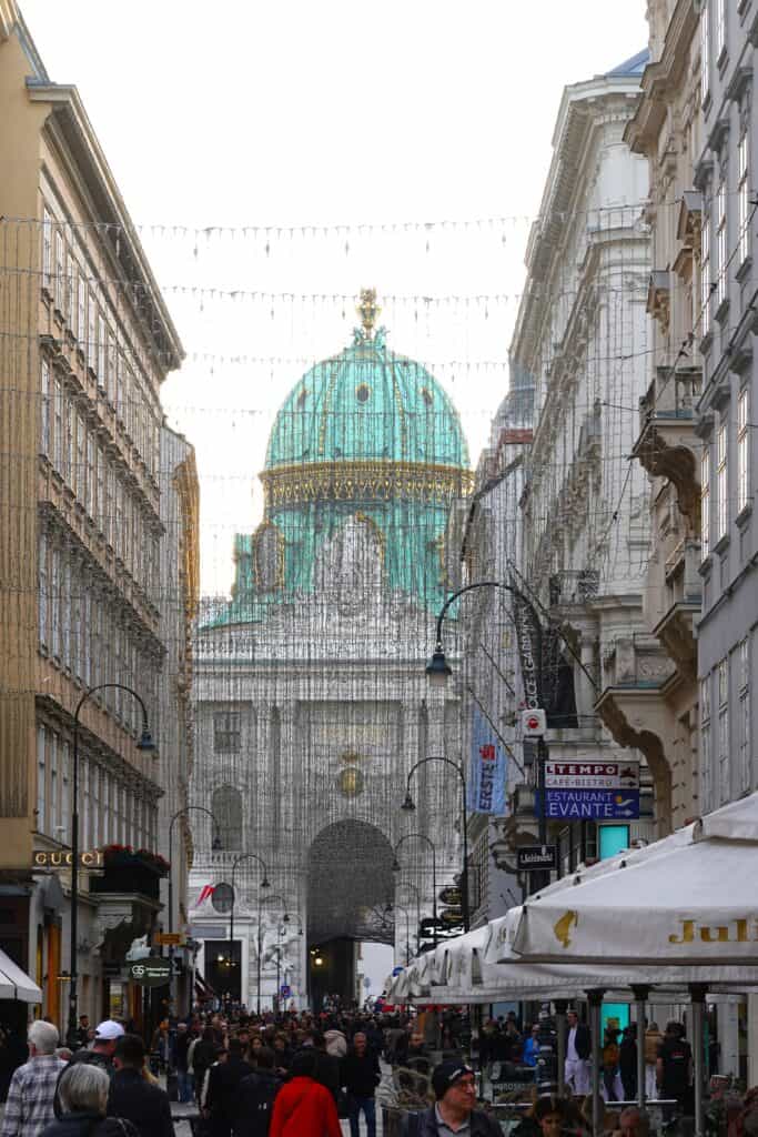 Michaelerplatz with Christmas String lights across road in Vienna