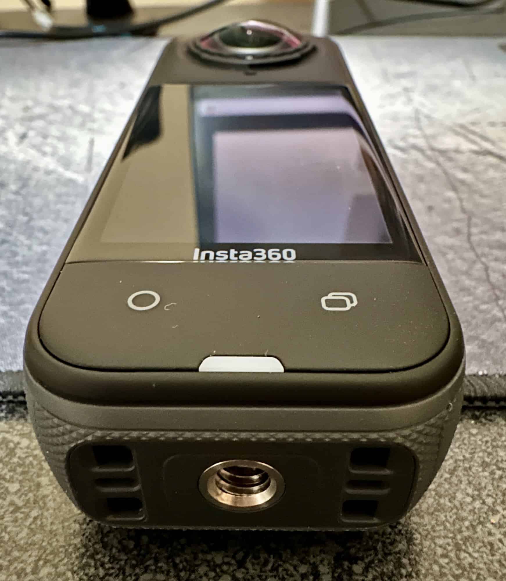 Insta360 X5 showing bottom 1/4" screw